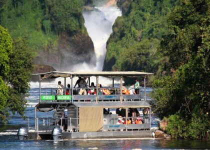 boat cruising in Murchison Falls National Park along the Nile river